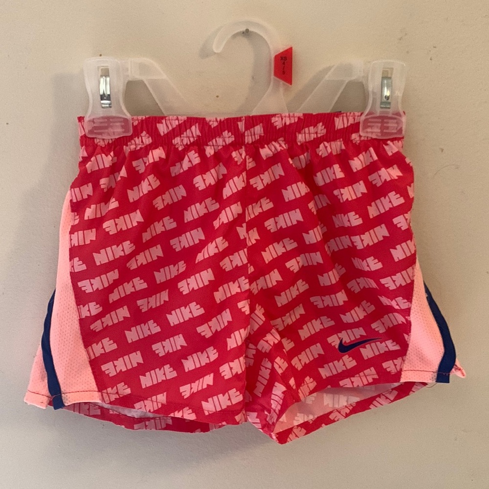 Pink Nike athletic shorts, size 5 in girls.